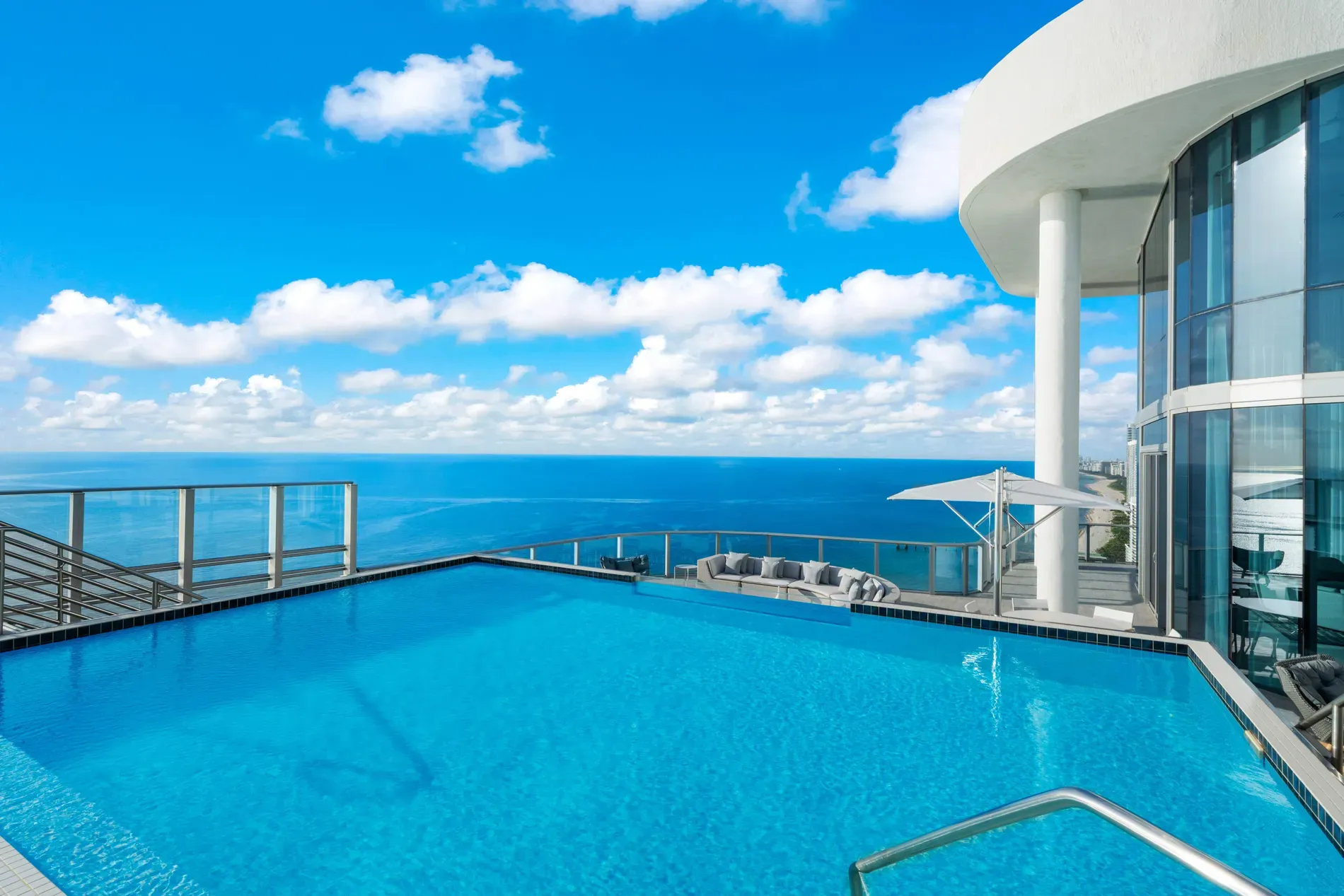 Here's the rooftop infinity pool melting into the ocean. Unreal.