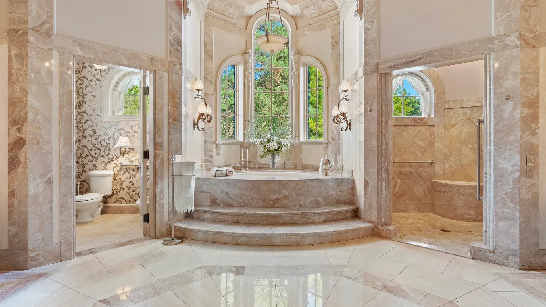 Bathroom flex. arched windows, marble everywhere. I mean, gorgeous.