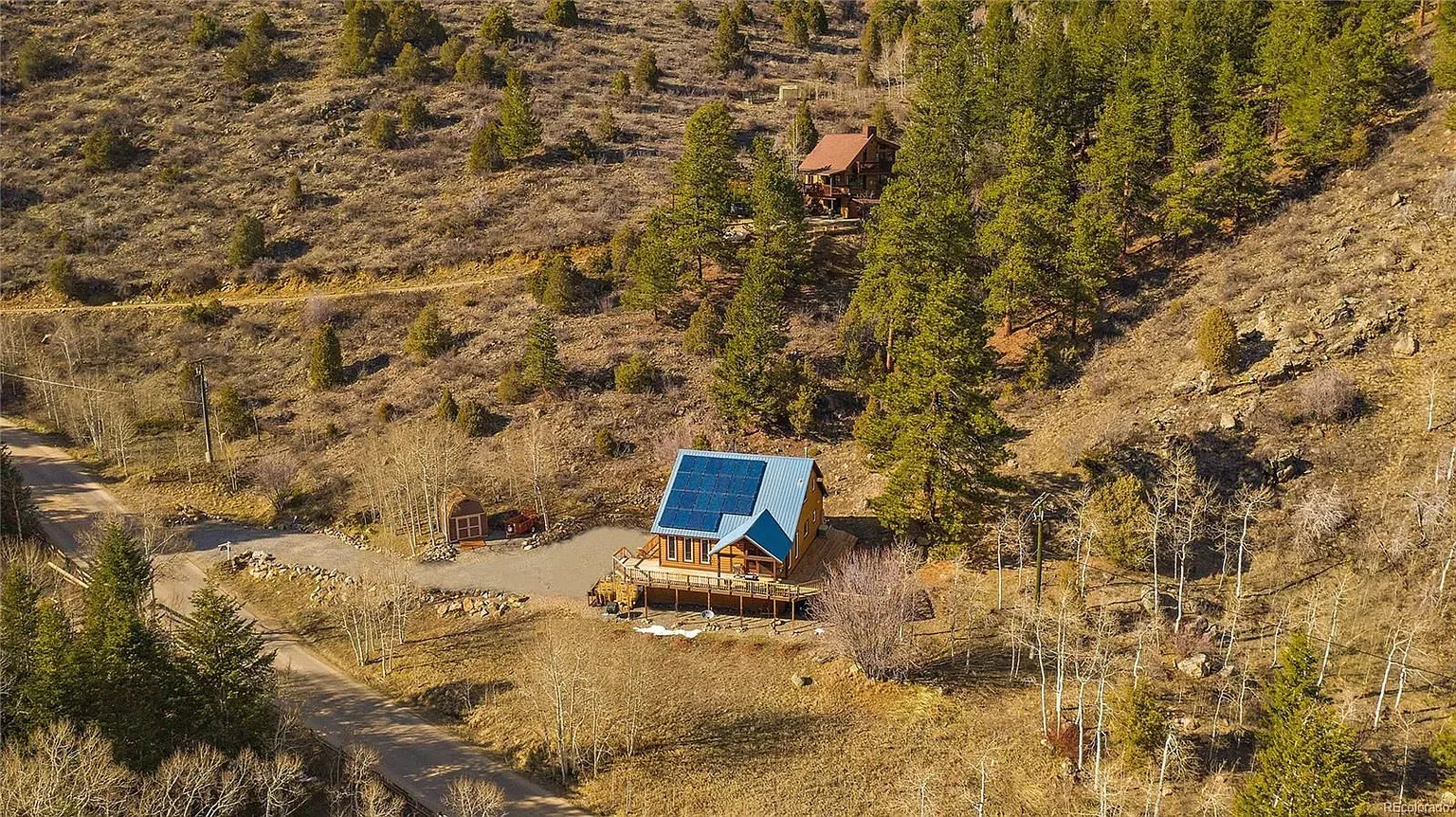 Blue roof against the mountains again—theme? Looks cool, a little loud.