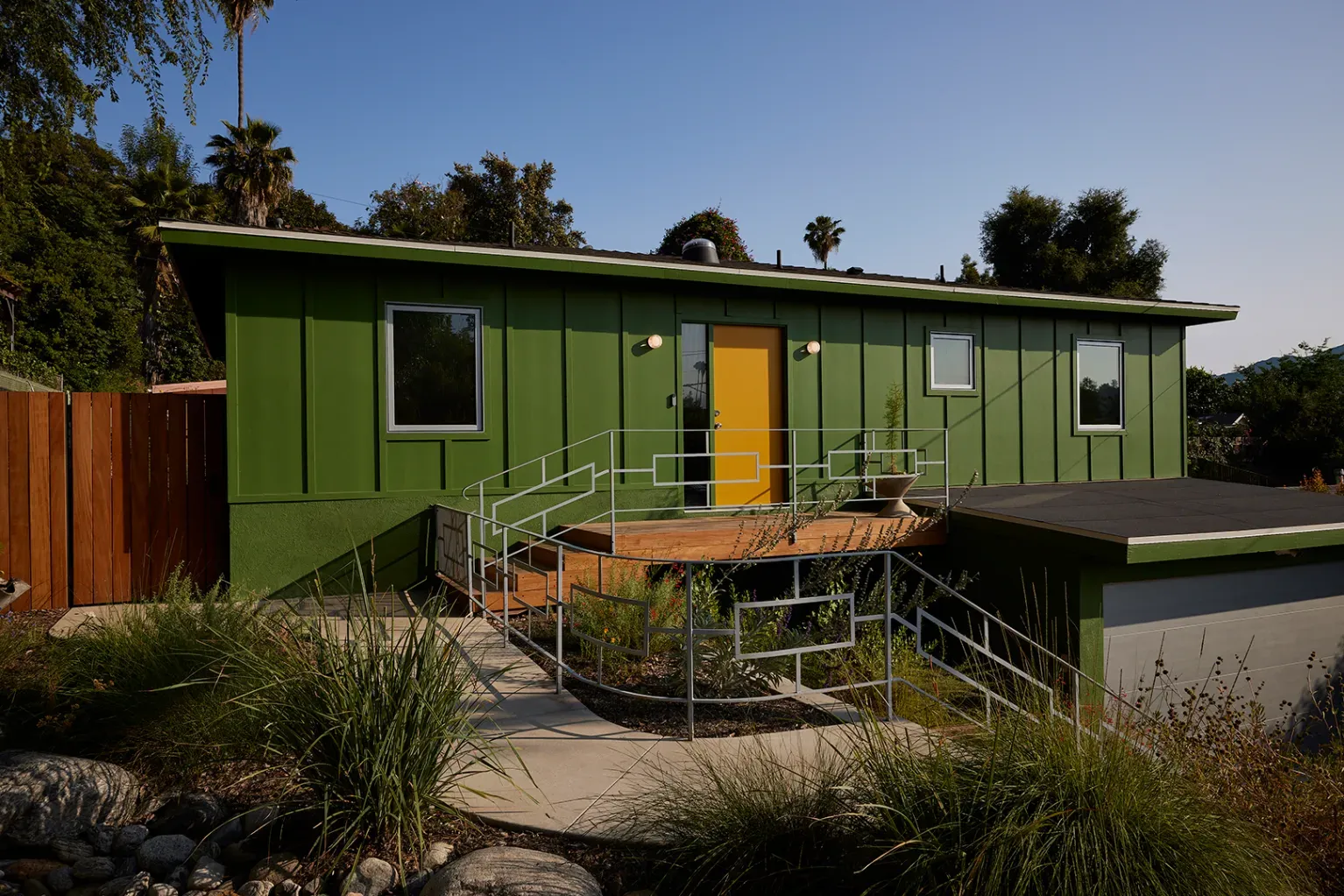 Back outside. bright green facade, clean lines. I mean, cool. but maybe too much?