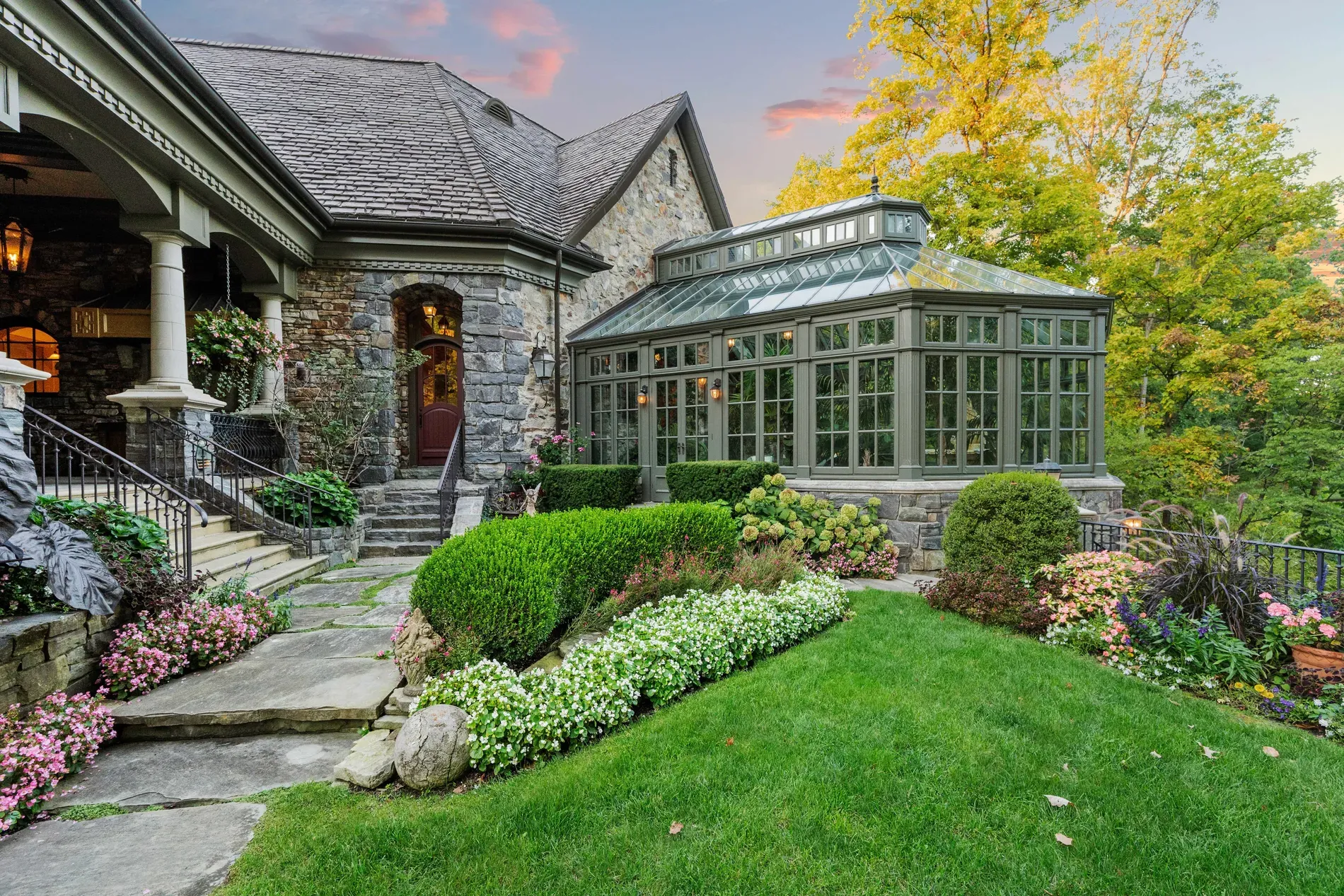 Back outside—stone walls, dark shingles, layered gardens. From here, super serene.