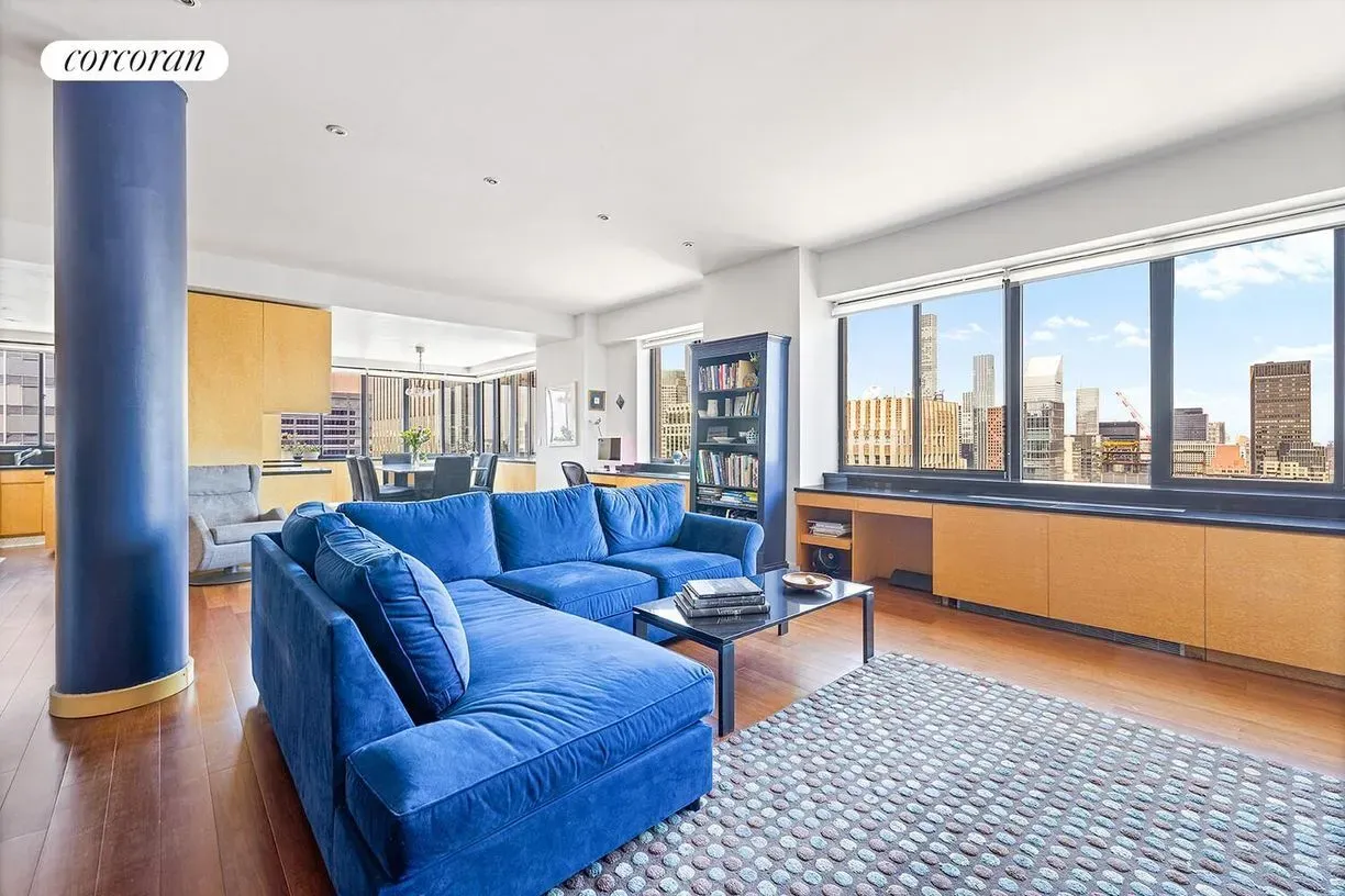 Big blue couch takeover. Cozy, but four million? I mean. it’s nice.