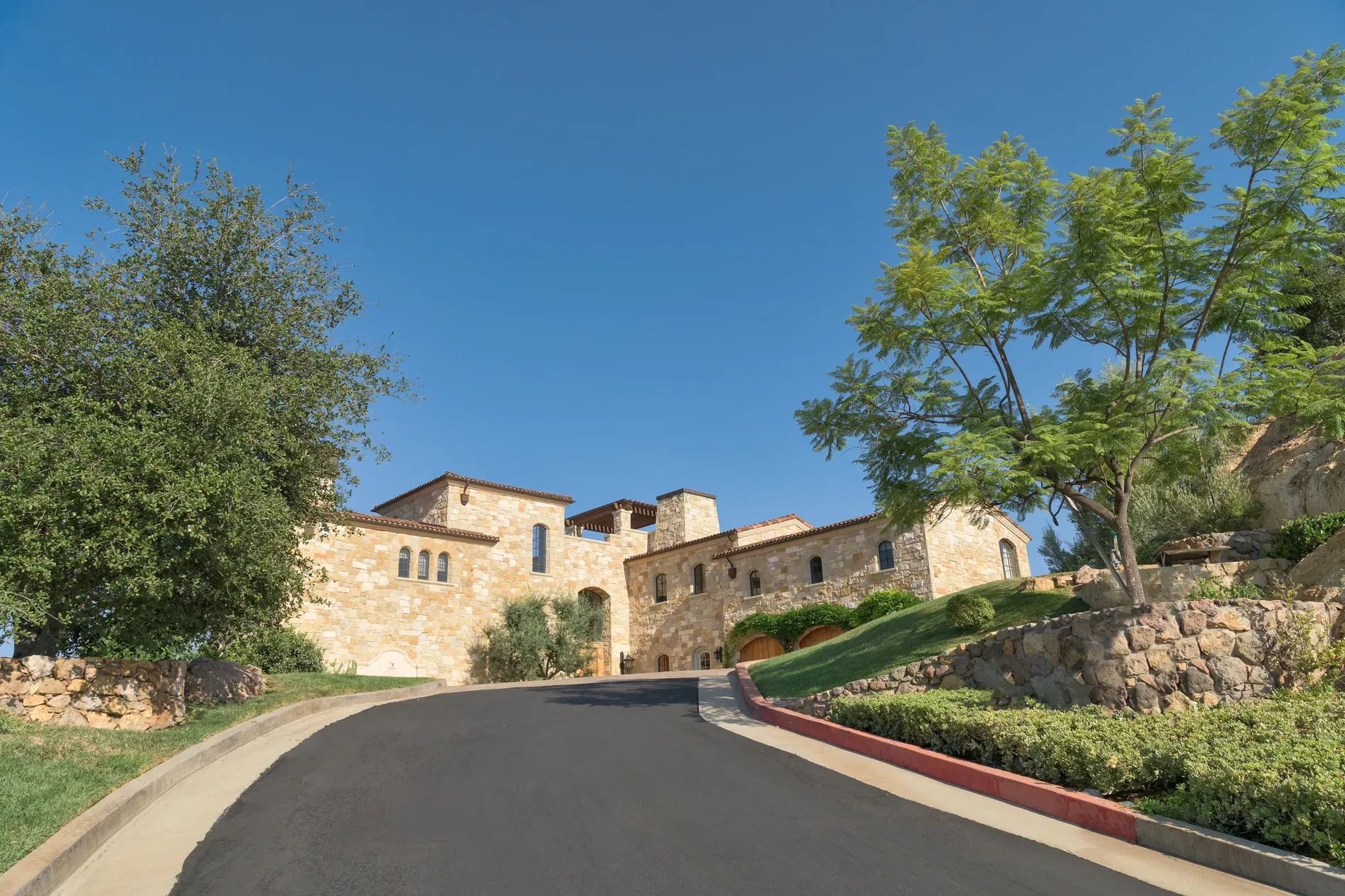 Back outside—warm stone glowing. Lots of arches and tiny flourishes.