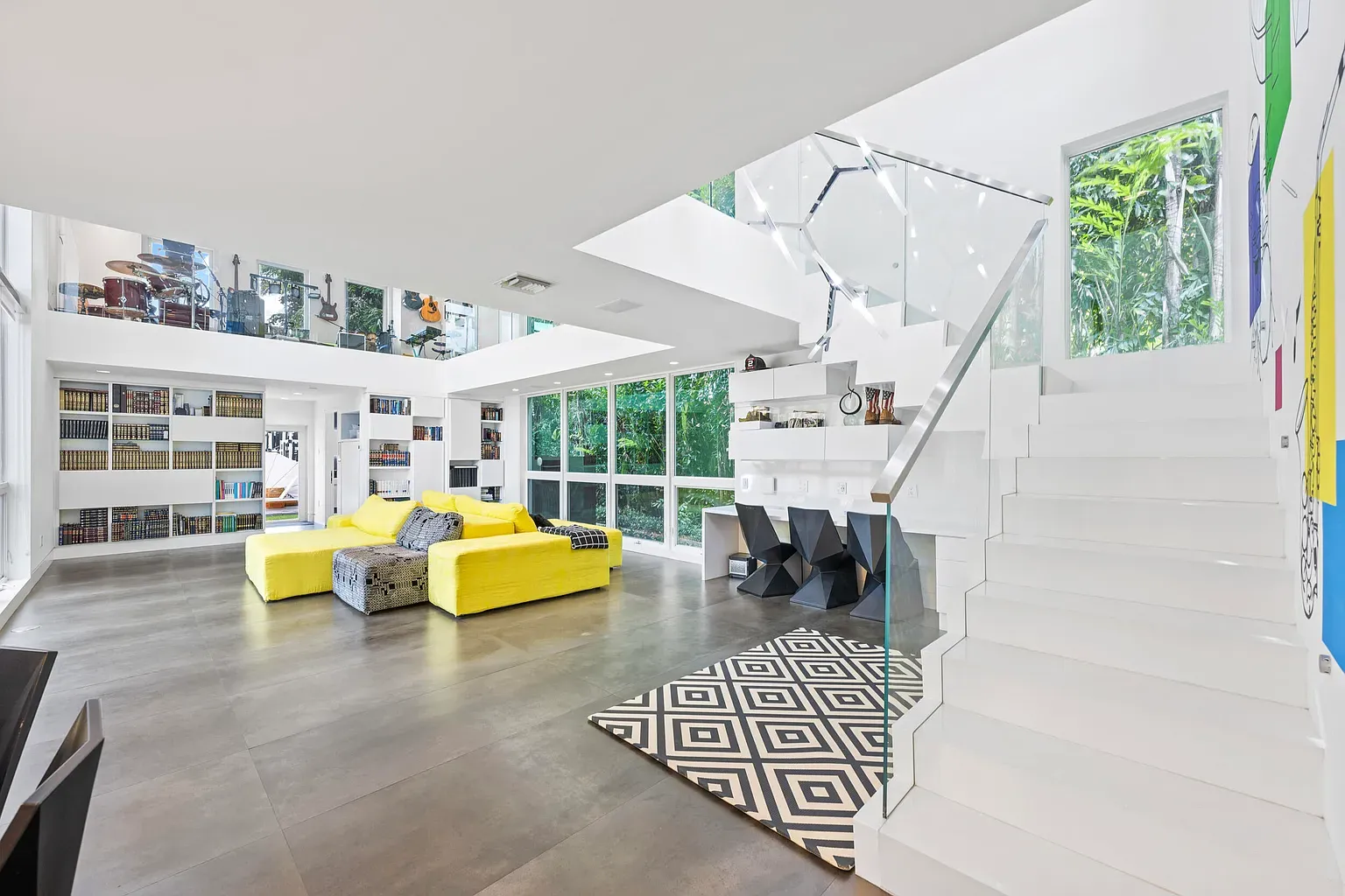 Yellow sofa takes over the room. Minimal everything else so it pops.