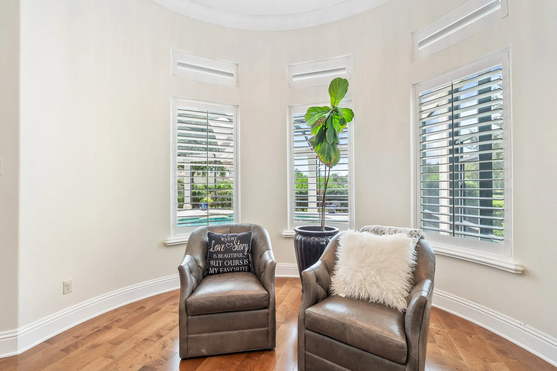 So many windows. Green views, warm floors. Airy without feeling empty.