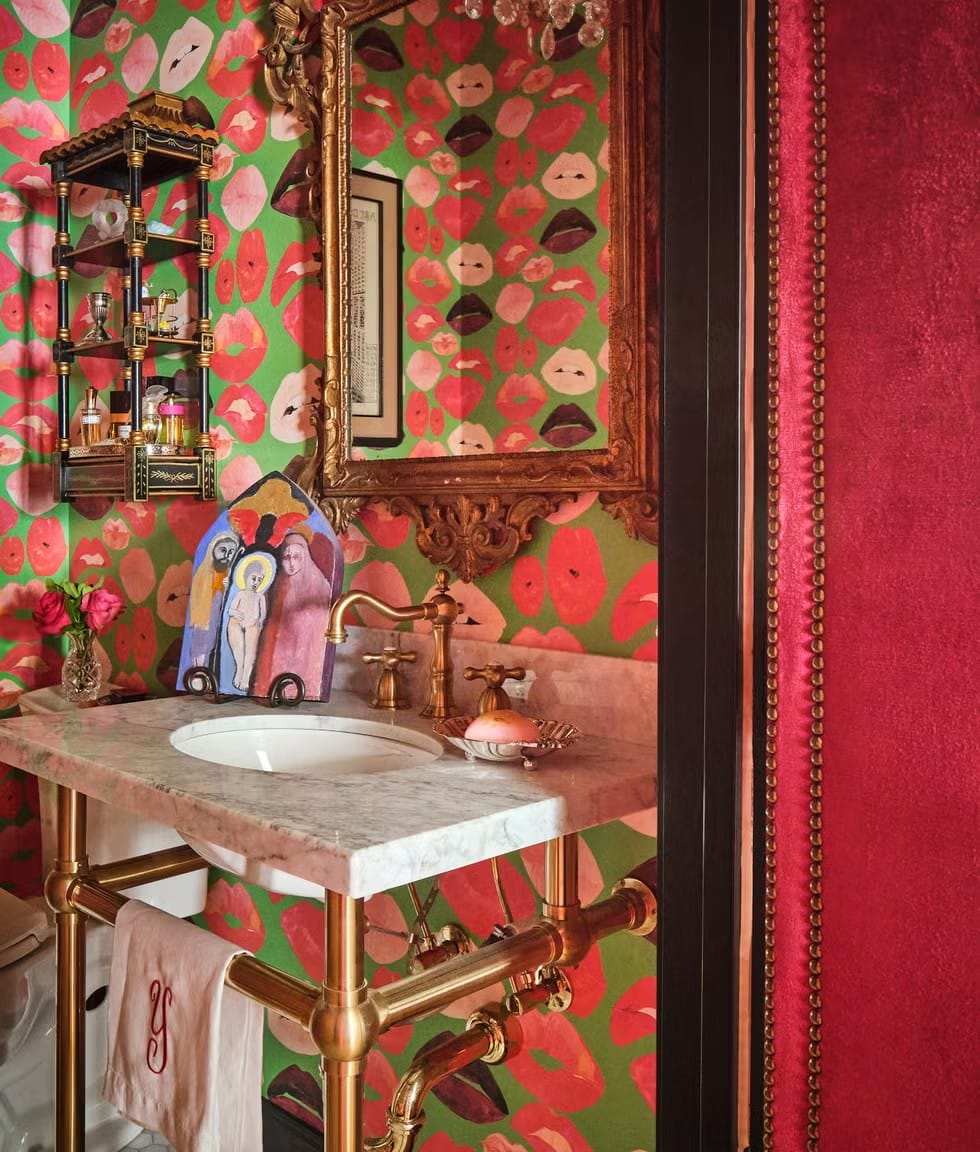And then the bathroom goes maximalist—giant blooms everywhere. Too much, or perfect?