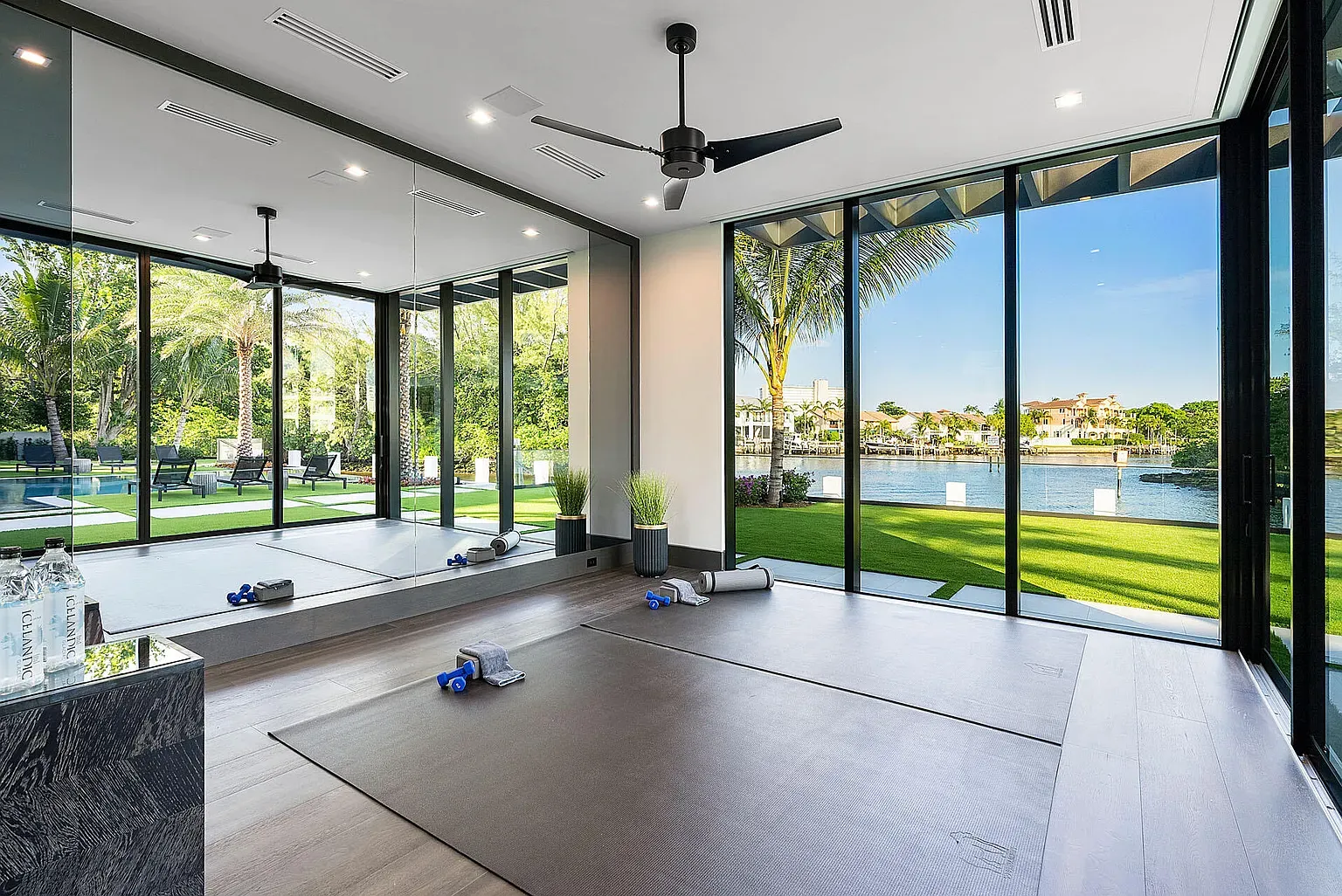 Gym with floor-to-ceiling water views. I'd never finish a set.