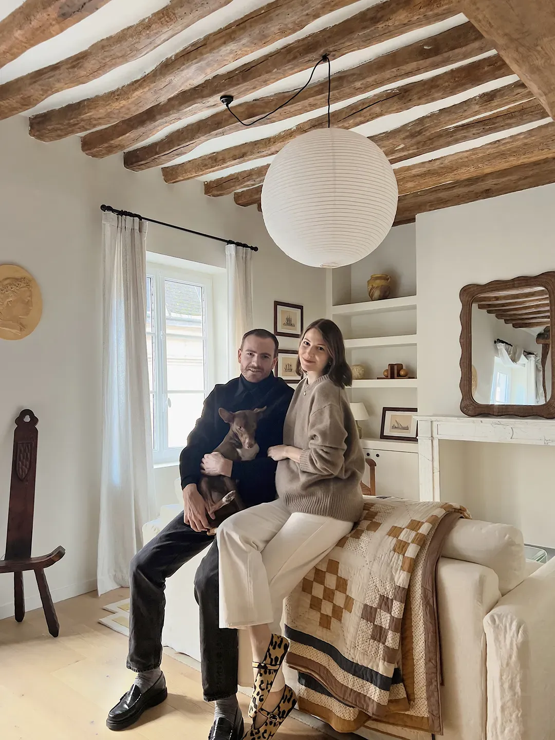 Here’s the main room — cozy mix of rustic beams and clean modern lines.