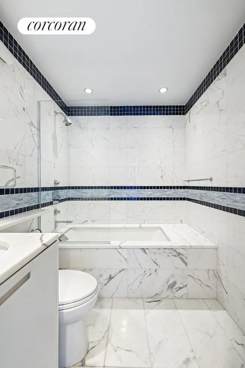 Marble everywhere, then a blue stripe. Anyone know why that choice?