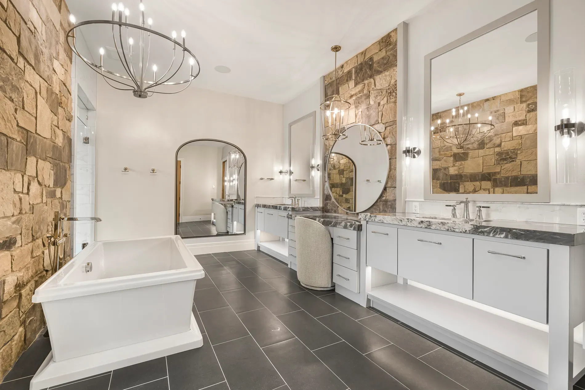 Not sure about this combo — stone wall with sleek fixtures. Kinda works though.