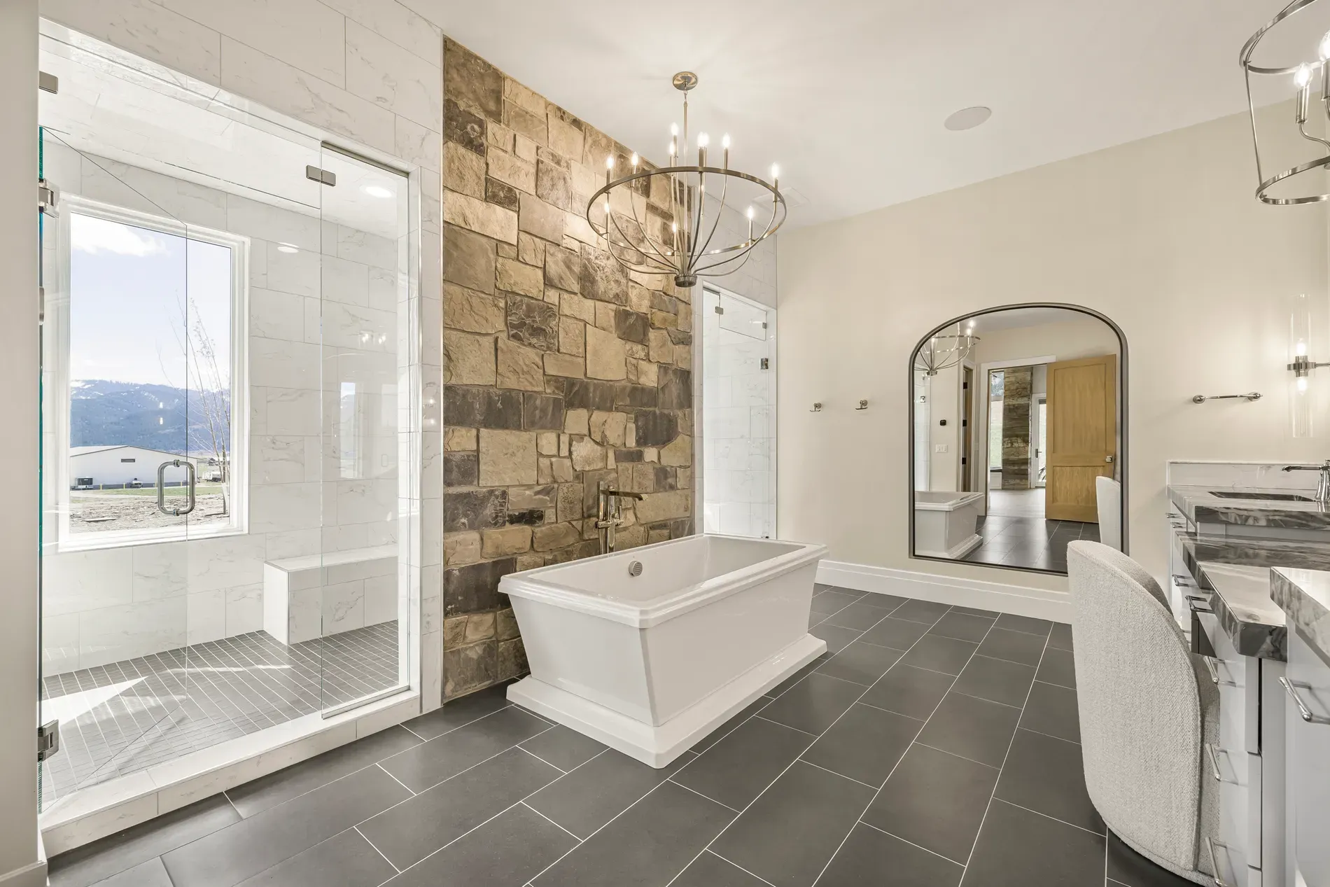 Freestanding tub goals. Soft gray floors, simple lines. Who’s bringing the bath salts?