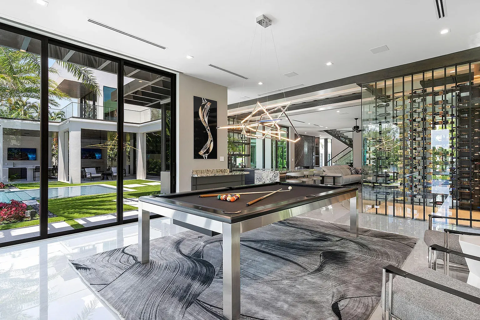 Stainless pool table is wild. Anyone know why they went full metal?