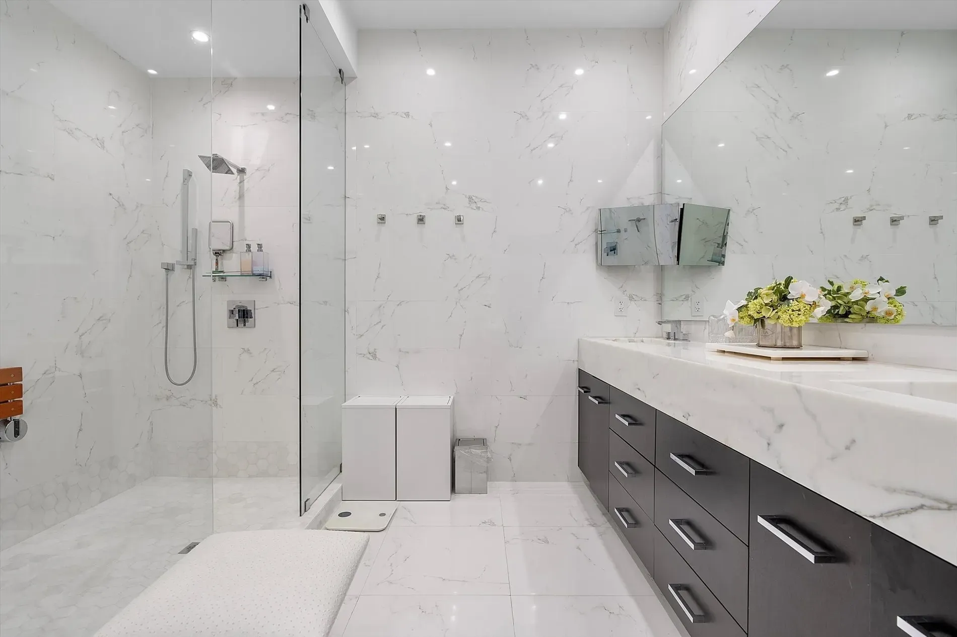 Bathroom is full marble—veins everywhere. Spa vibes, but I’d slip instantly.