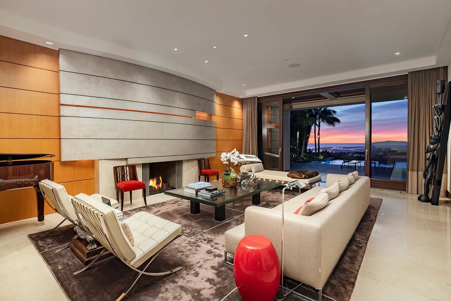 Here’s the living room—horizontal wood panels pop. Fireplace looks sleek, cozy vibe.