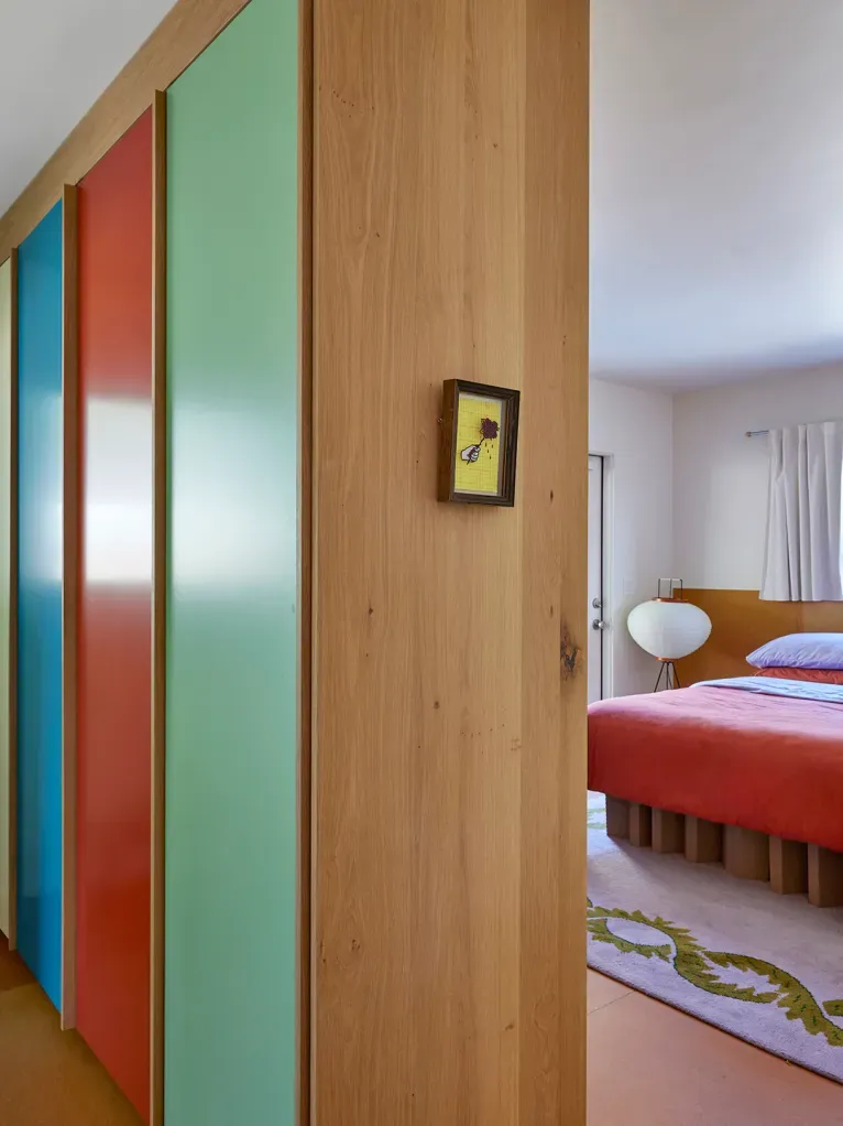 And then this partition. red/teal/orange sliders with wood. Why this combo?