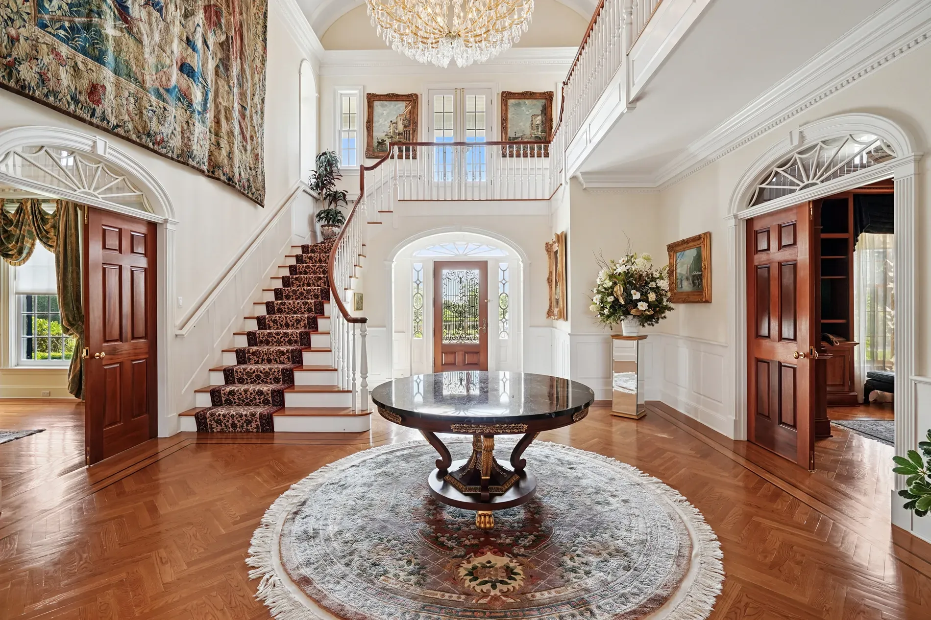 Foyer flex. spiral cherry staircase, ornate runner. Anyone know that carpet pattern?