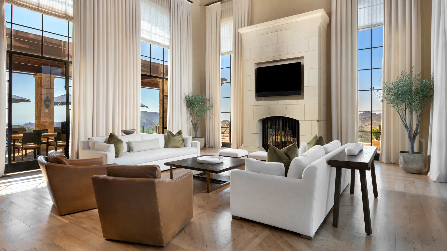 Stone fireplace to the ceiling, TV above. Neck strain or fine placement?