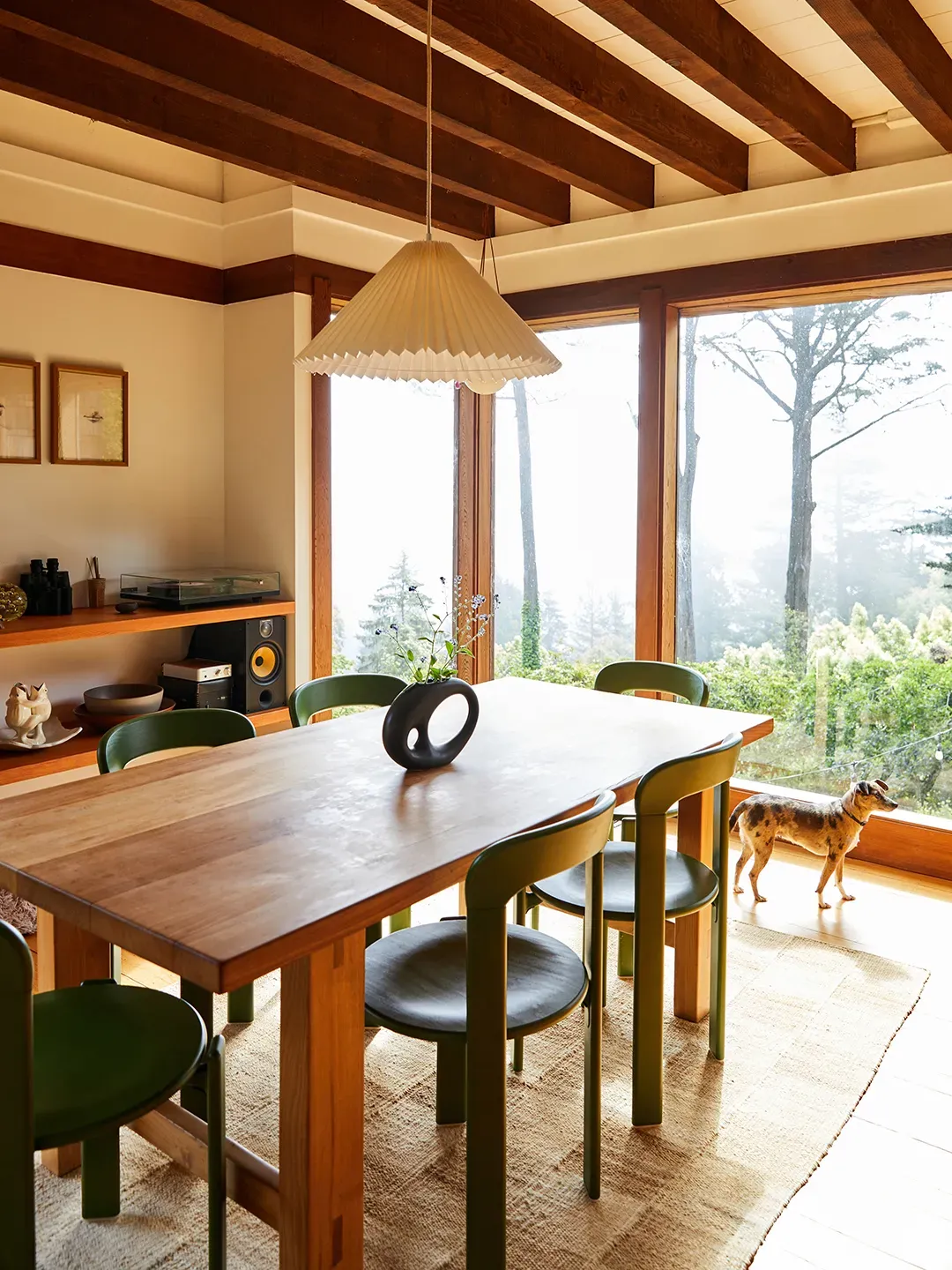 Big slab table, sturdy legs. Looks it could survive a family reunion.