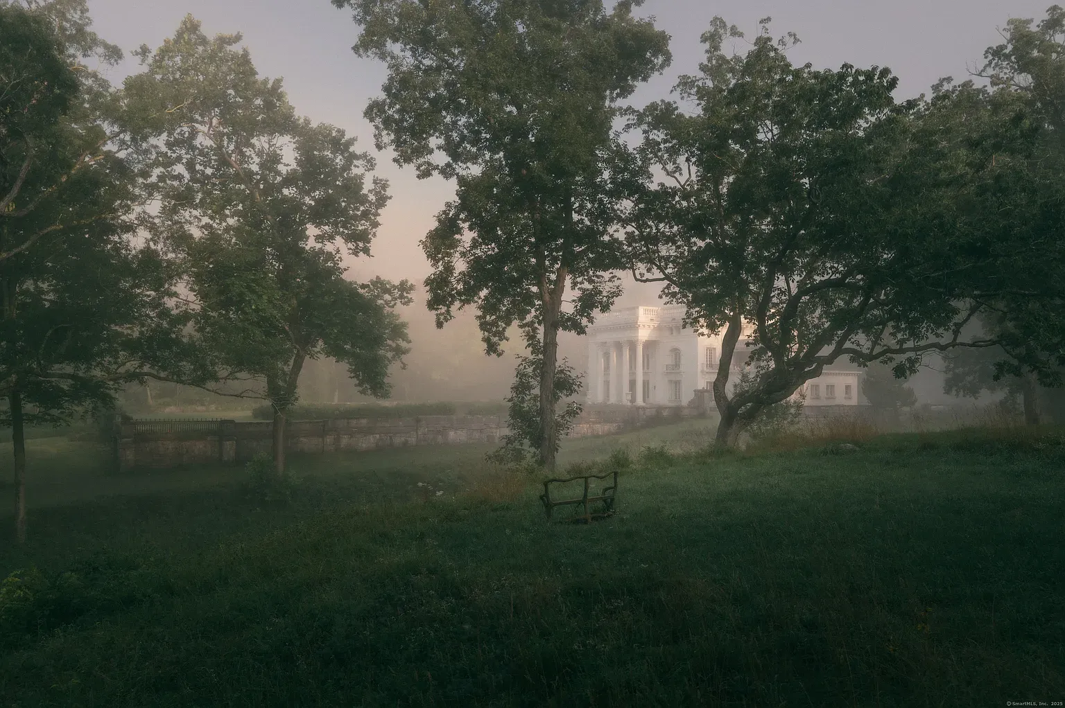 Here's the front - white columns fading into fog. Kinda haunting, kinda fancy.