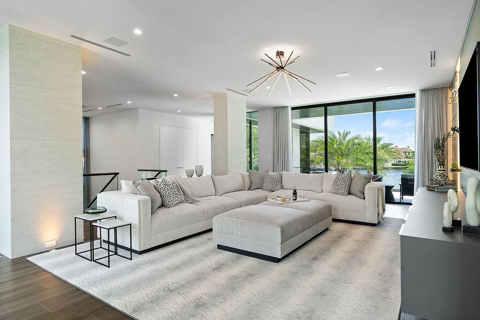 Okay, this living room slides right into the patio. Clean lines, comfy vibe.