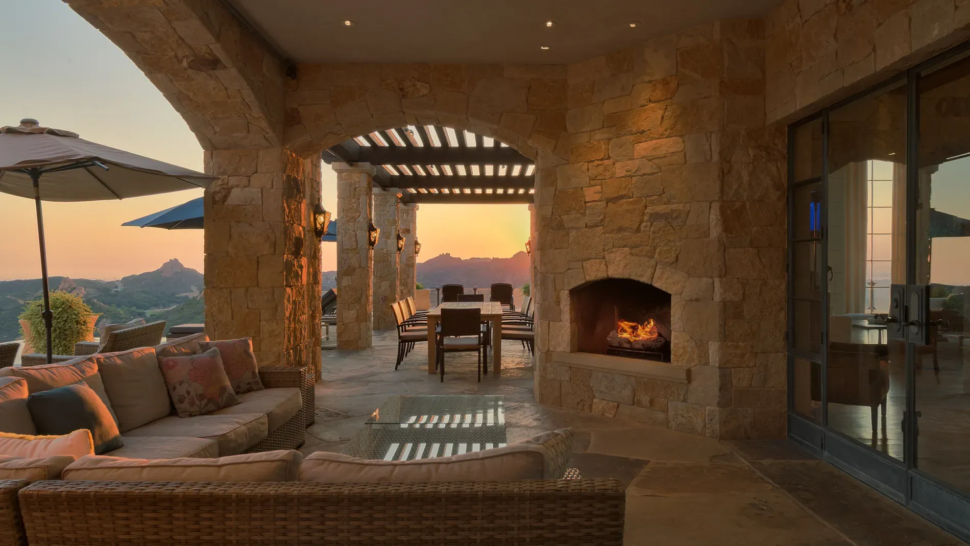 Stone archway framing the sunset—romantic. I mean, dramatic, but I’m in.