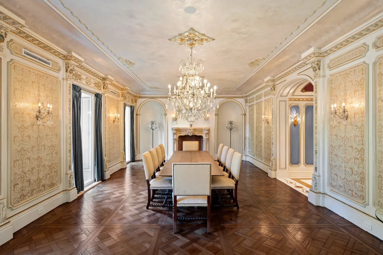 Dining room dripping gold leaf and crystal. I mean, it’s a lot.