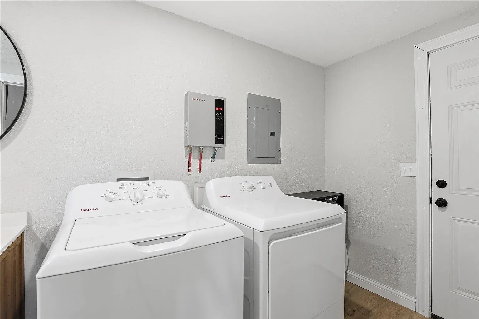 Here’s the laundry—bright, simple, actually nice. Room for folding and complaining.