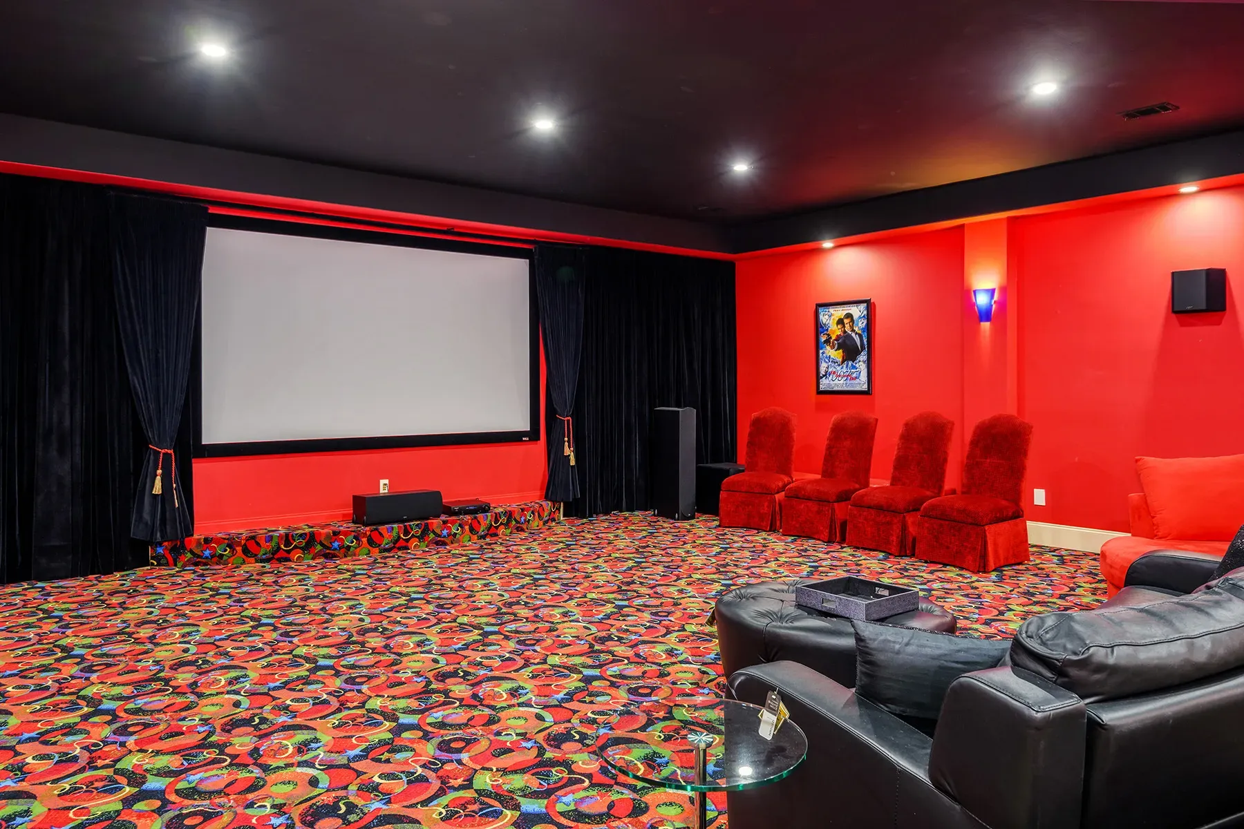 Home theater went full red with wild carpet. Not sure, but bold.