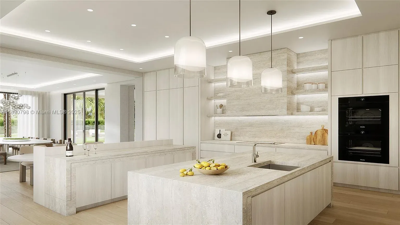 Here's the kitchen—light wood, light stone, big island. Not mad at it.