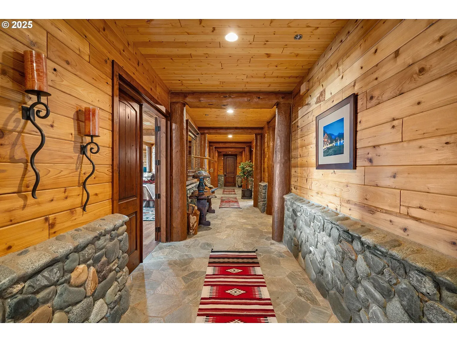 Warm hallway with honey wood panels and beams. Smells cedar in my head.