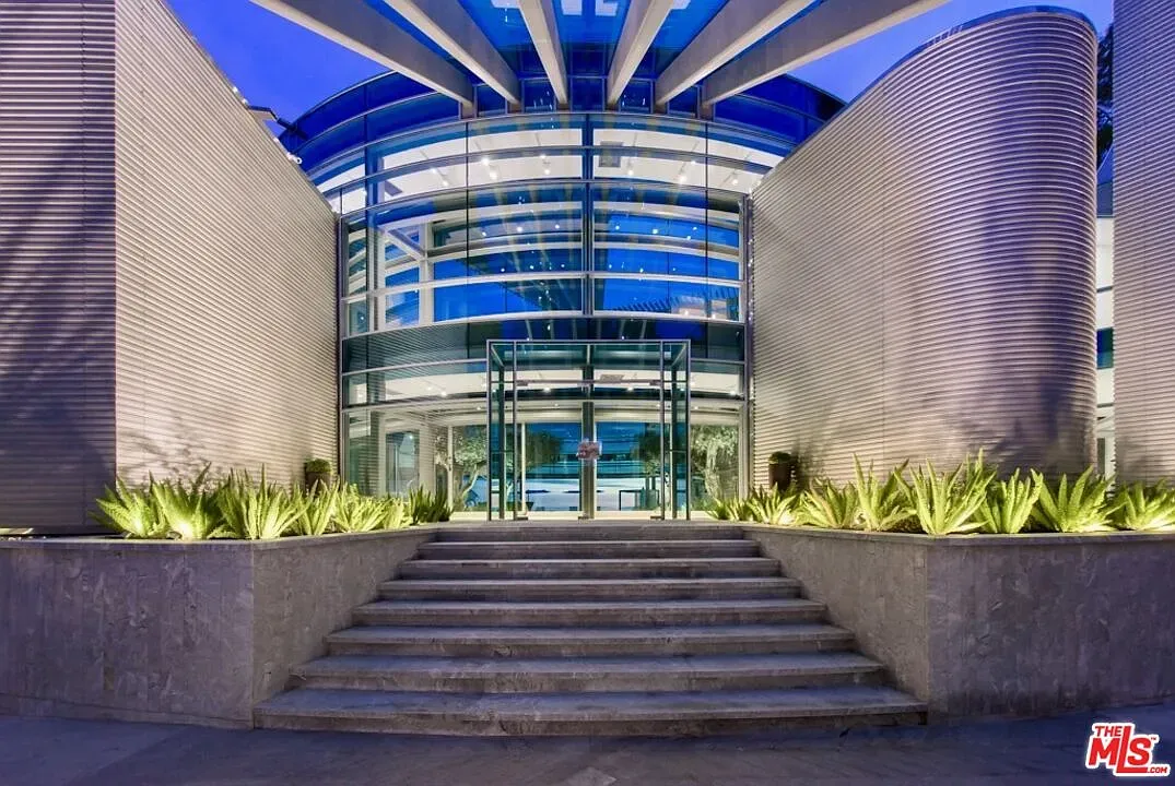 Front steps to big glass doors. Not subtle, but it works.