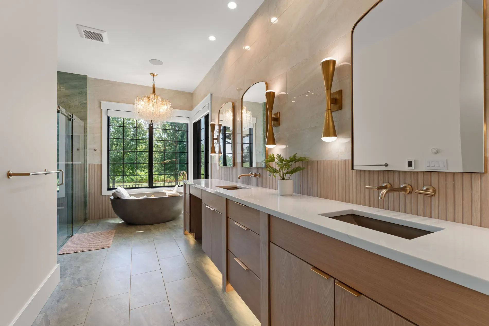 Tub by the window, trees for company. That soak would last hours.
