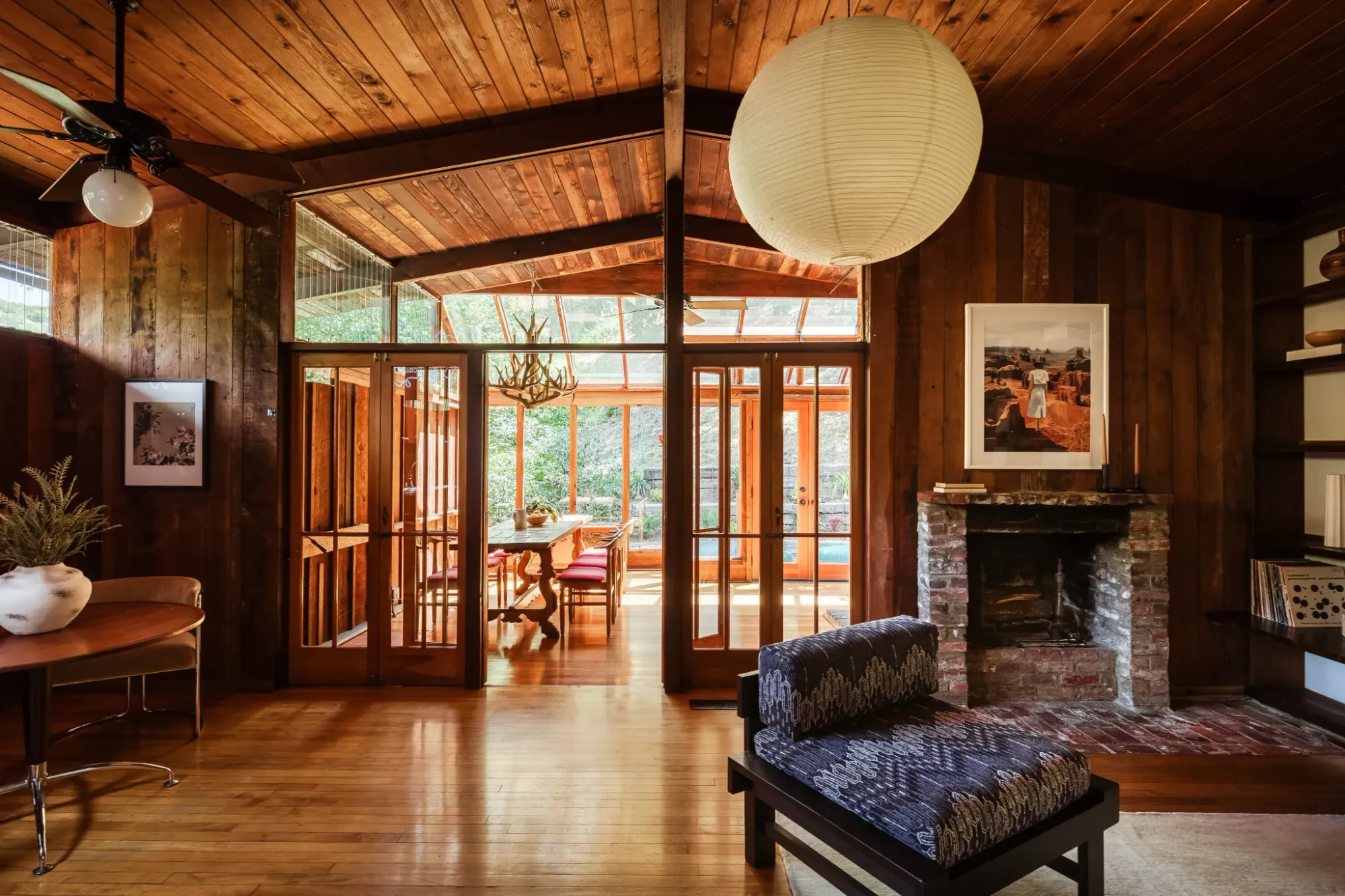 Those angled beams go hard. Mid-century cabin vibe with all the wood.