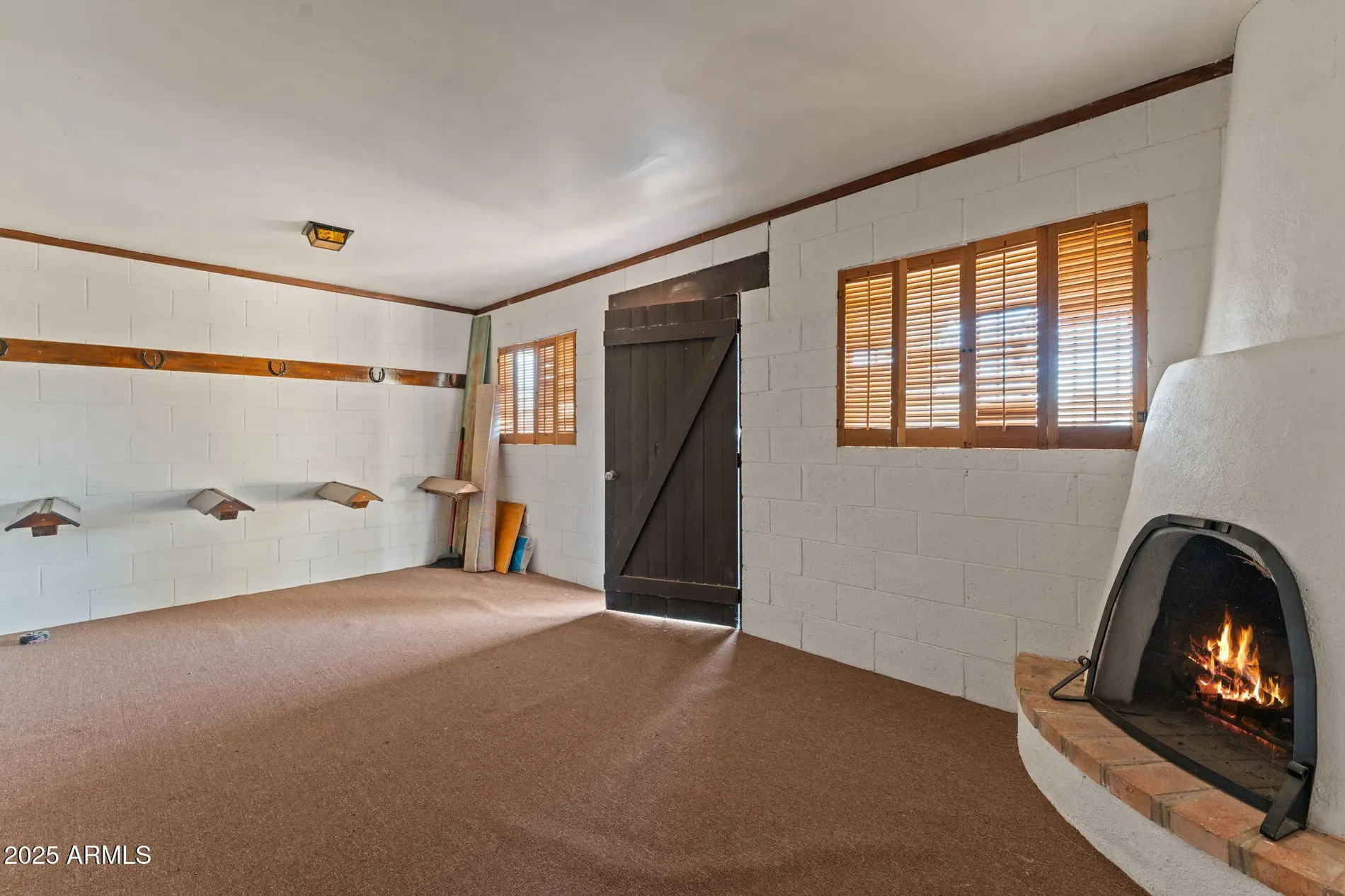 Cinder block walls with carpet is a combo I wasn’t expecting.