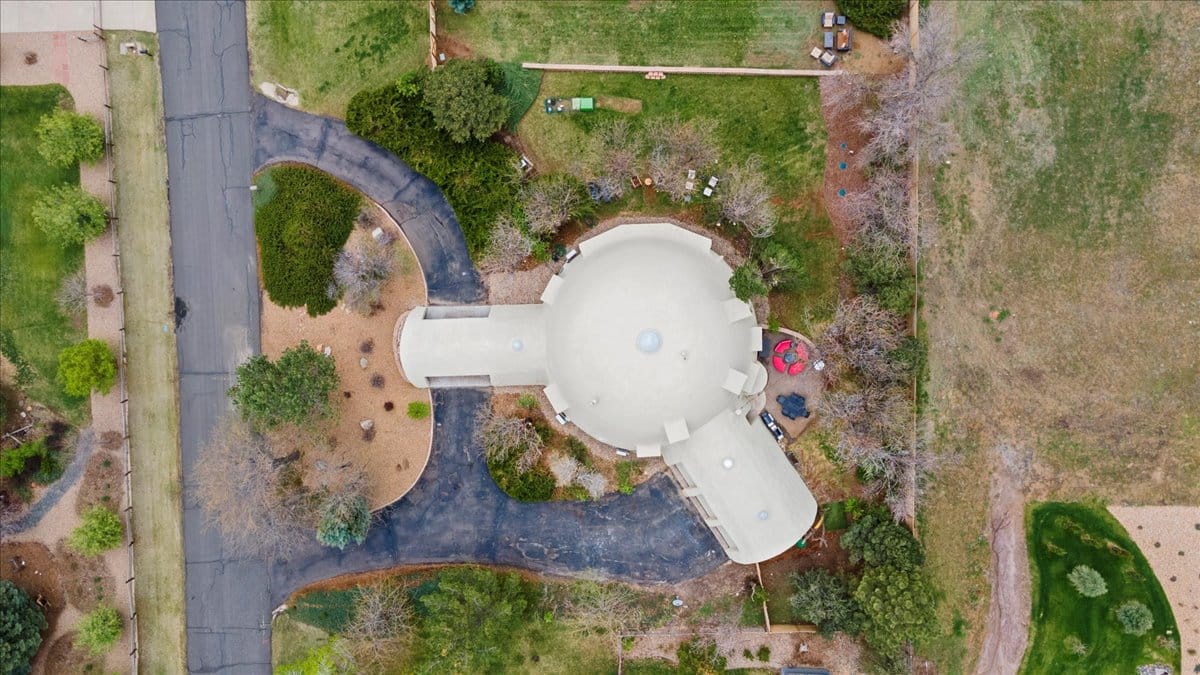 From above, the whole place is a circle tucked into greenery.