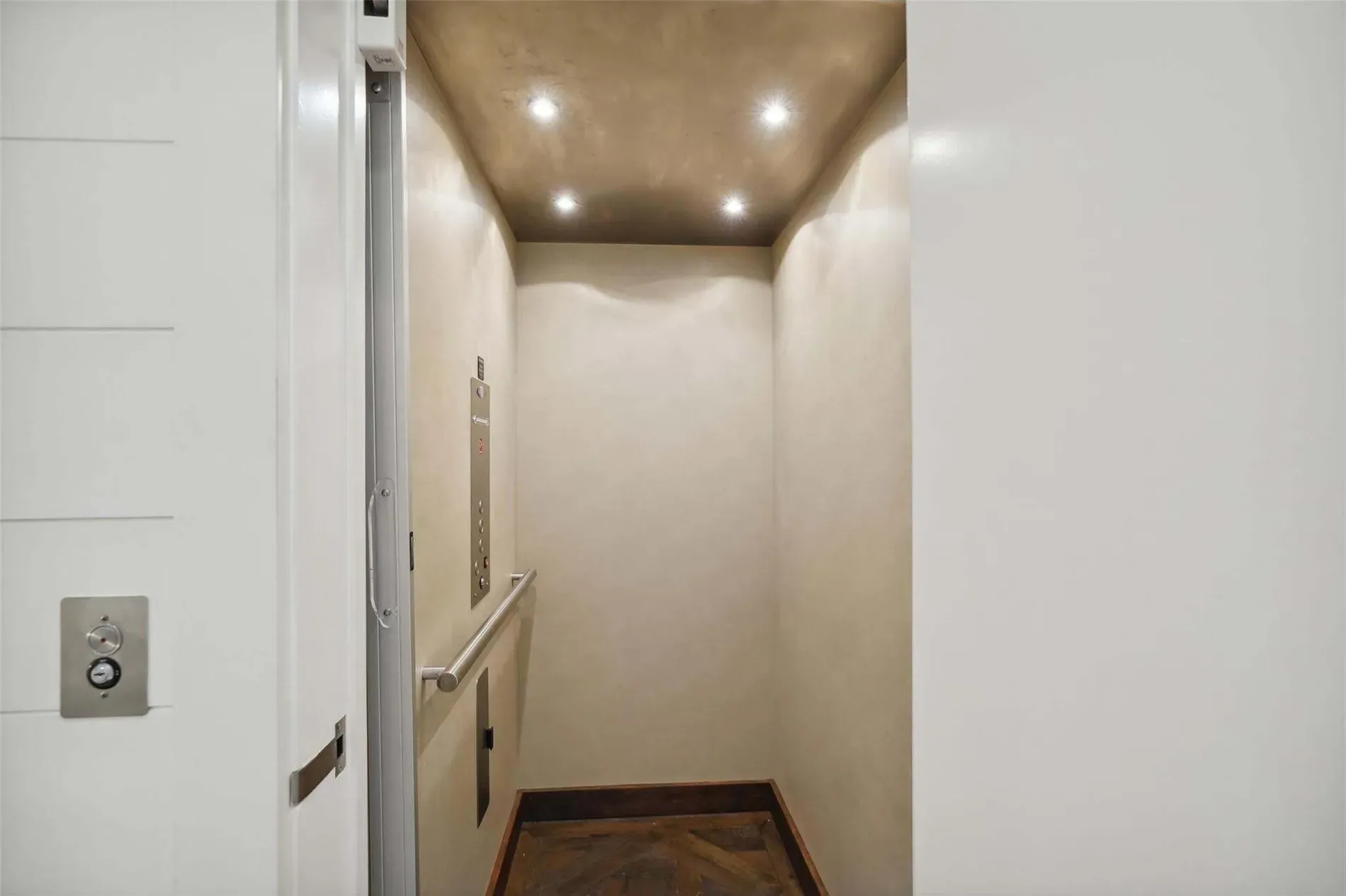 Random flex. private elevator. Warm beige box, soft LEDs. Why am I impressed?