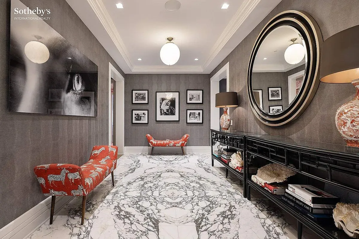 Hallway flex. swirly marble floor, soft gray walls. Echo central but gorgeous.