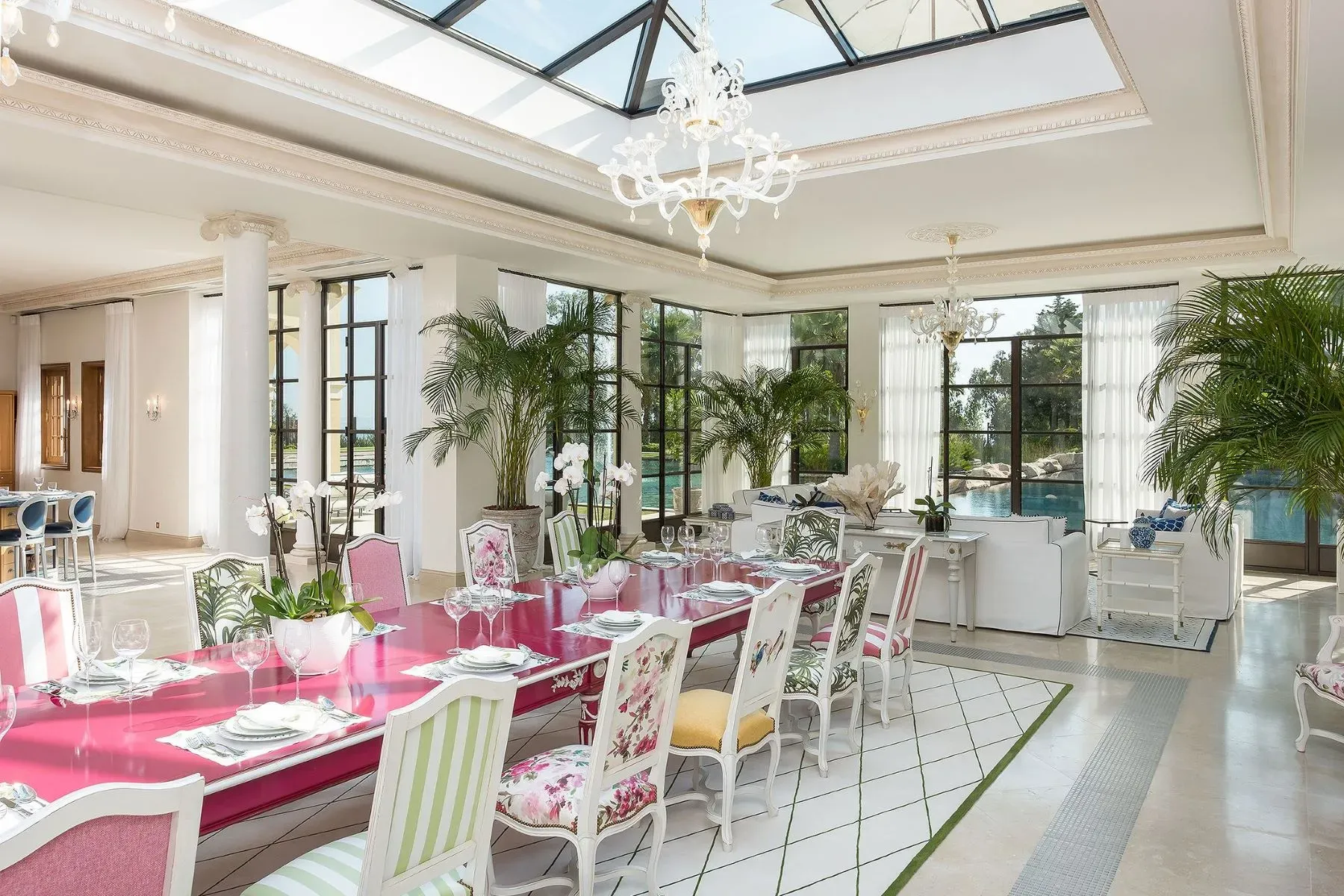 Oh, pink dining table with pastel chairs. Kinda adorable, kinda bold.