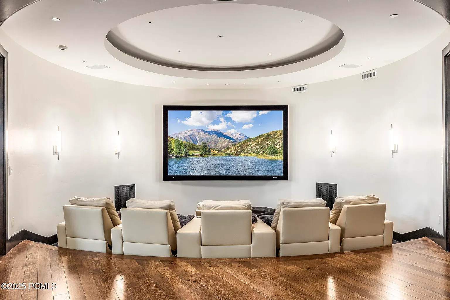 Here's the theater with that curved ceiling. Seats look serious. Popcorn mandatory.