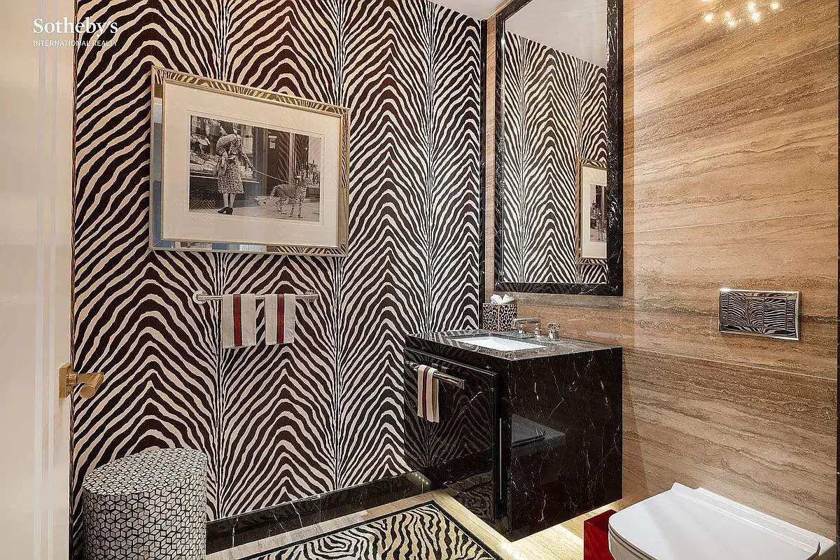 Okay, zebra powder room. Love the drama, but is it dizzying IRL?