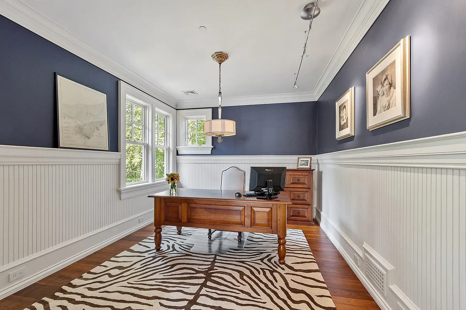 Navy office with crisp wainscoting. Feels productive already.