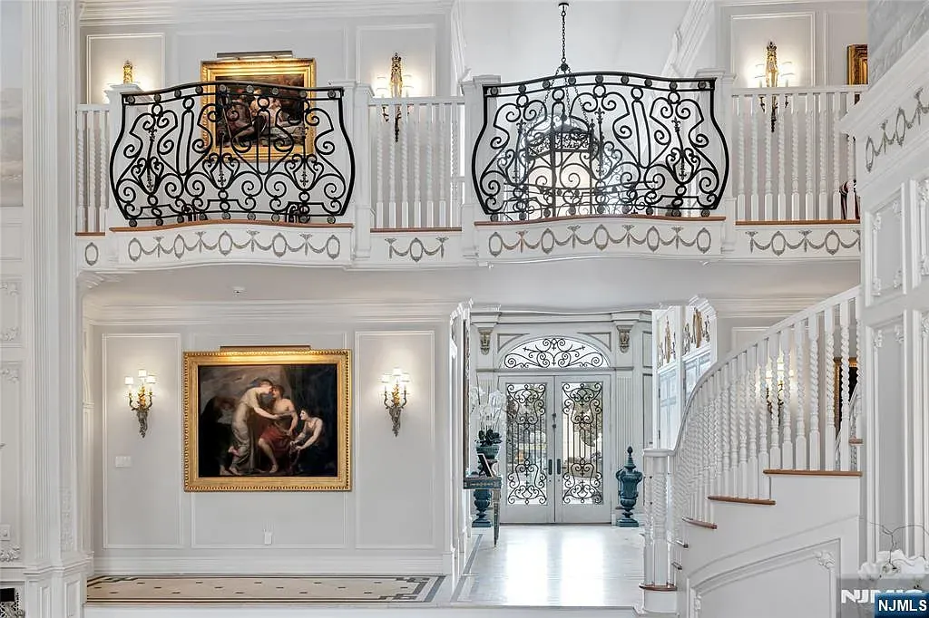 Here's the foyer—spiral staircase, tall ceiling. From this angle, it feels huge.