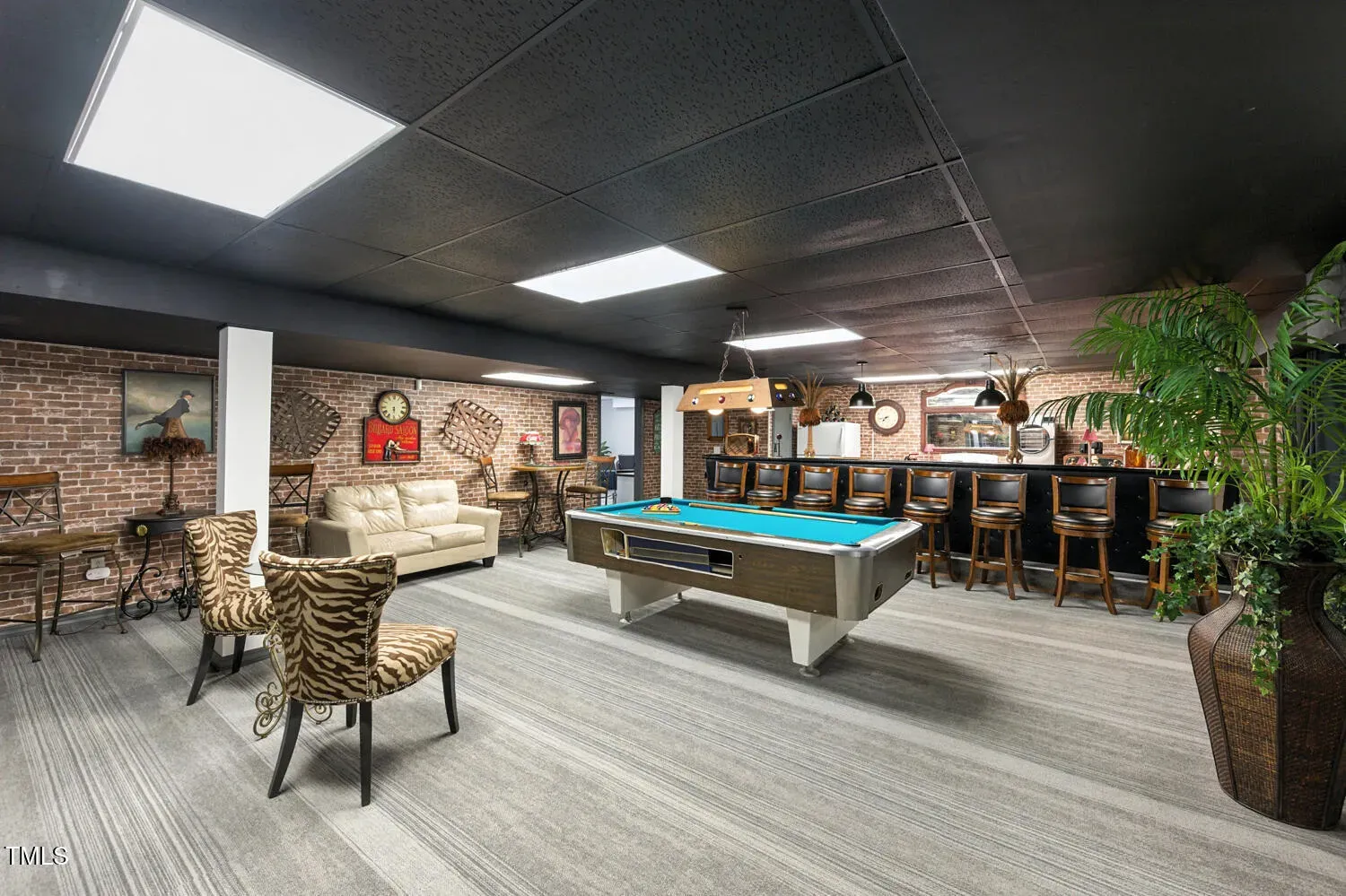 Okay, this game room — blue felt pops. Fun, maybe a little theme-park?