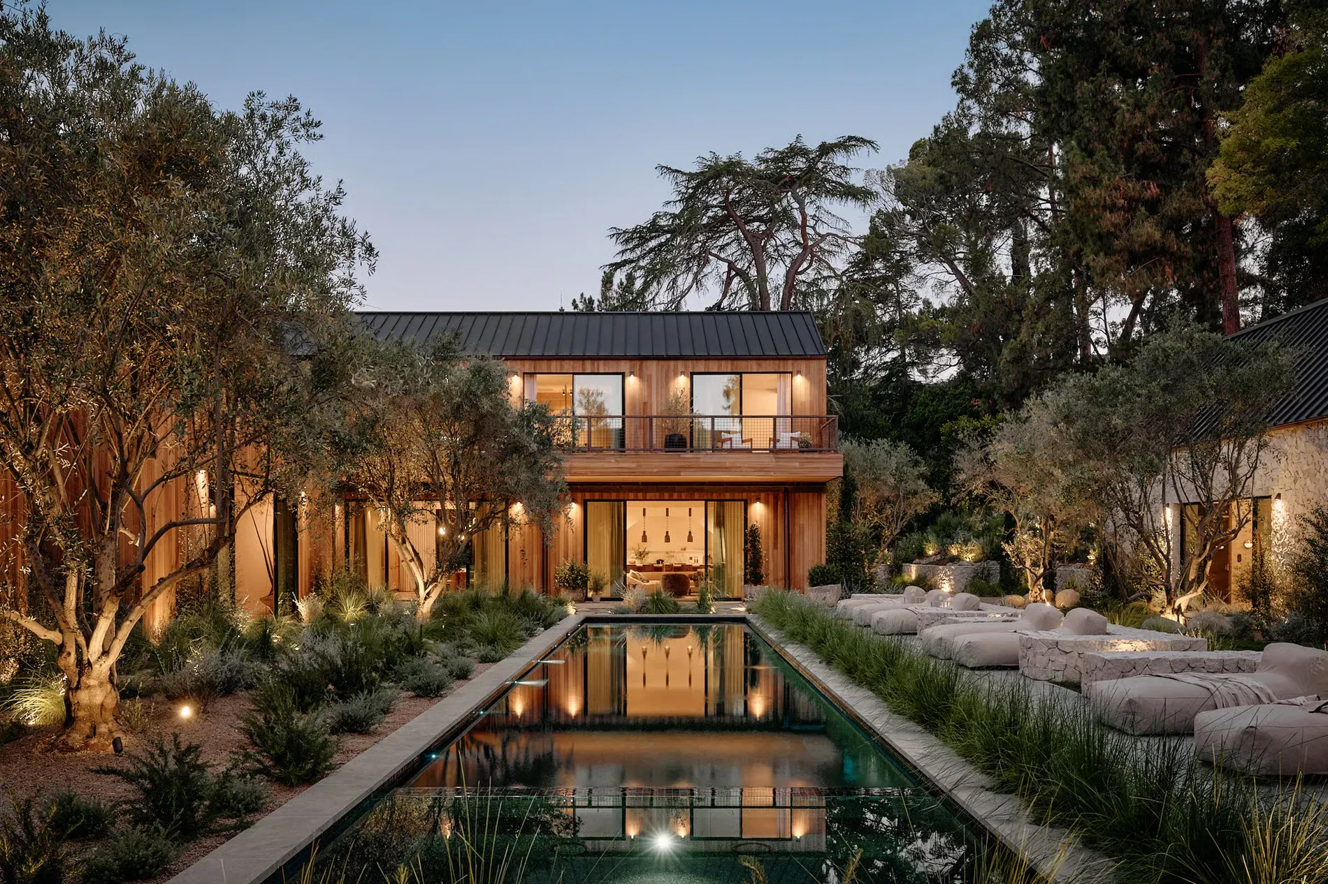 Here’s the front — wood siding melting into the garden. Already in love.