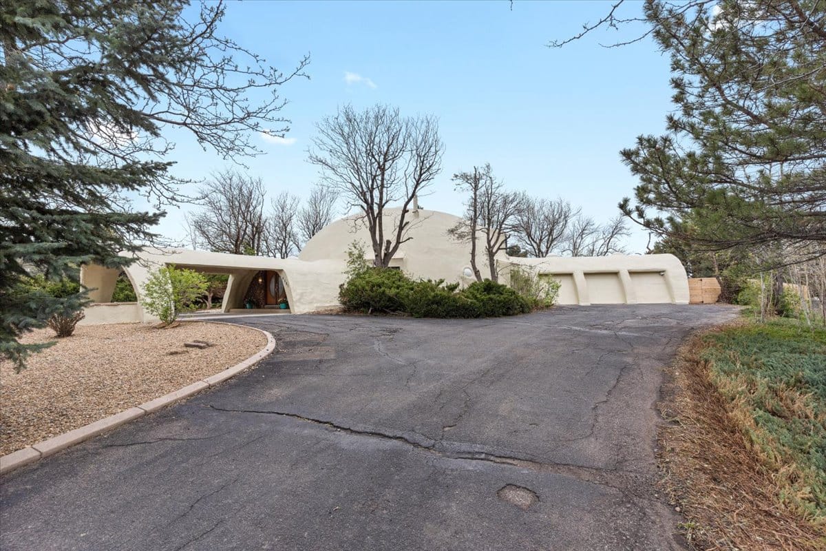 Earth-sheltered bump in the hillside. Kinda Hobbit, kinda spaceship.