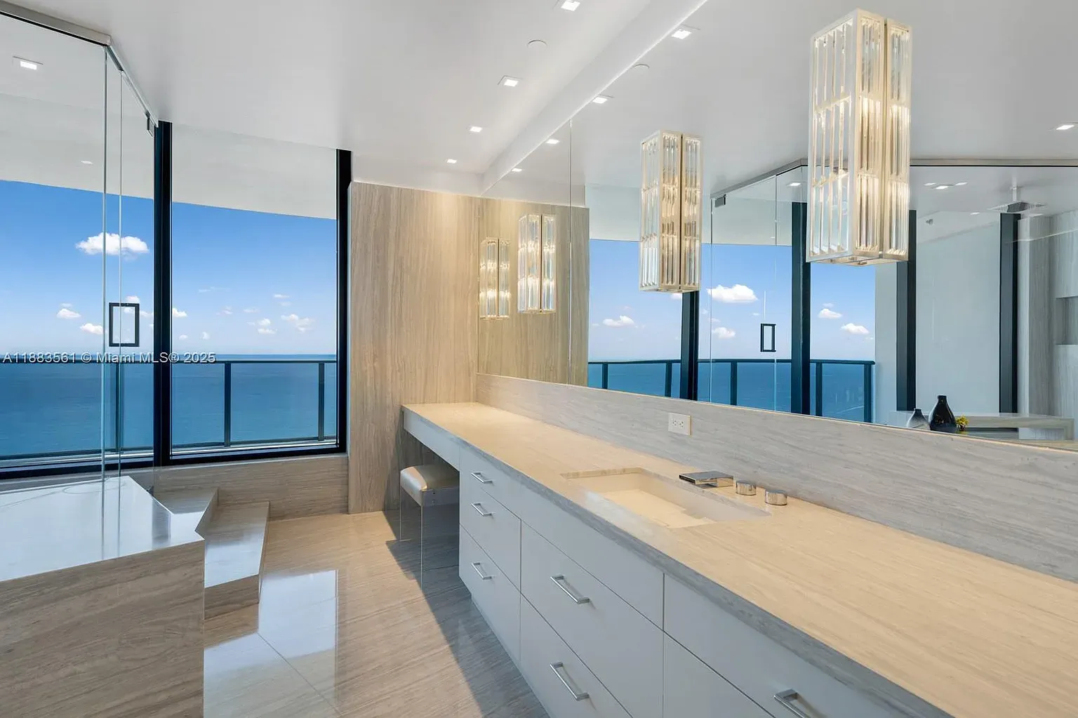 Beige marble everywhere, veins art. Not sure chrome fits, but wow.