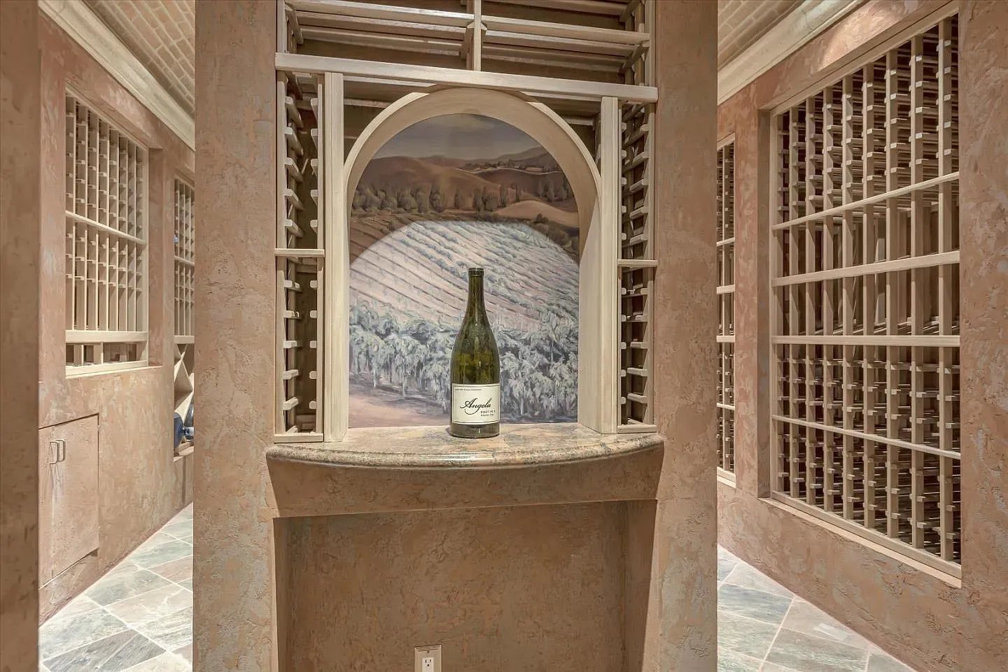 Vineyard mural in the wine room is a little on the nose, but lovely.