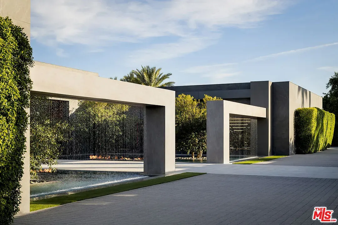 Concrete tunnel entry with cutouts and water peeking through. Dramatic, but cool.