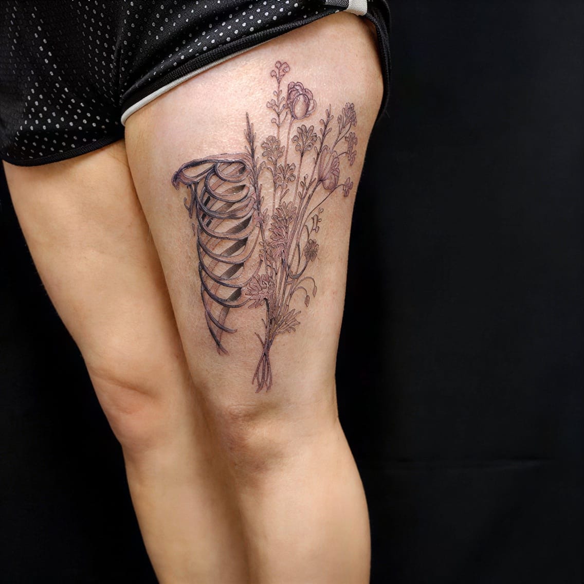 Ribcage tucked floral for a private flourish