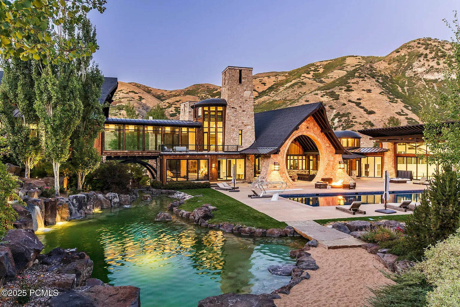 Back outside to those sharp angles and big roof. Mountains doing the heavy lifting.